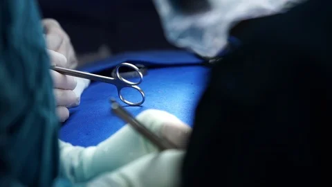The hands of a surgeon Stock Footage 127702378