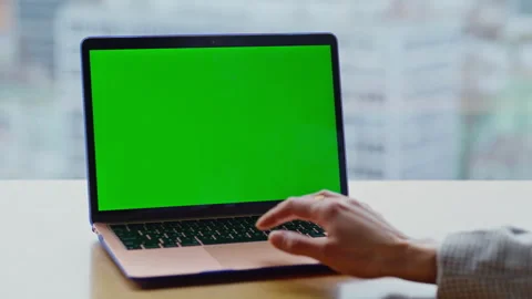 Hands swiping chromakey computer touchpad at cityscape remote workplace closeup Stock Footage 335246284
