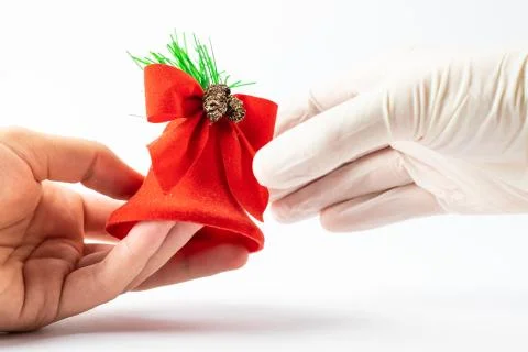 Hands symbolizing the course of holidays during the coronavirus period. Chris Stock Photos