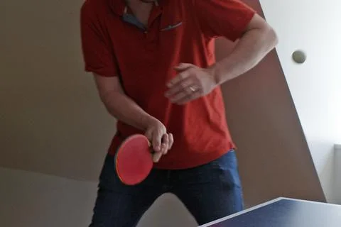 The hands of a table tennis player Stock Photos