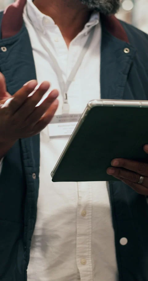 Hands, tablet and meeting at warehouse for logistics, checklist or team talk for Stock Footage 327703663