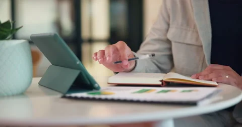 Hands, tablet and notes with book at office with charts, review and stats at Stock Footage 336224496