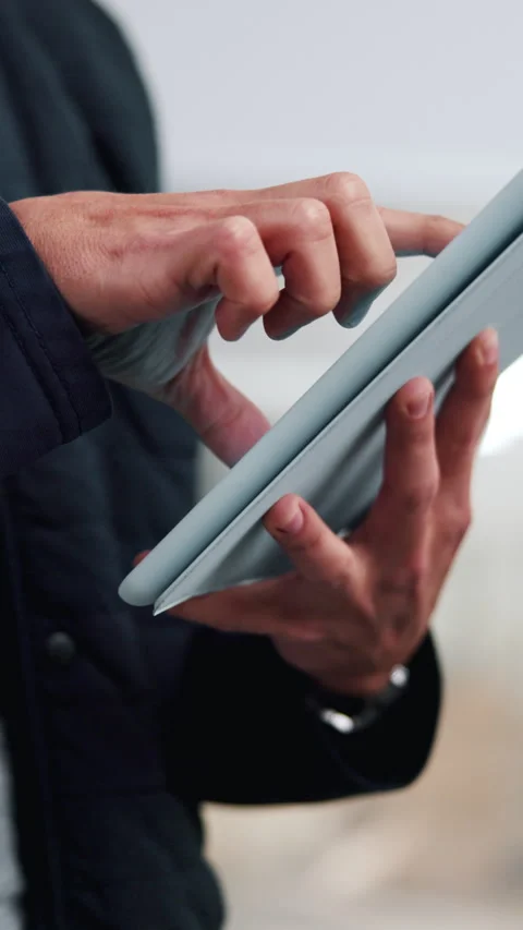 Hands, tablet and person scroll in business, publication or review story with Video stock 342312359