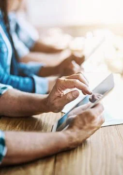 Hands, tablet and queue in office for search, scroll and typing with team for Stock Photos