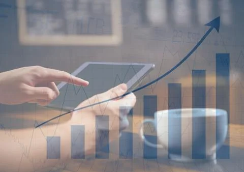 Hands with tablet in cafe and blue graph overlay Foto stock