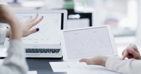 Hands, tablet graph and business people on laptop brainstorming or comparing Stock Footage 222776998