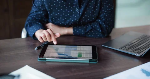 Hands, tablet screen and business woman with laptop in office for investment, Stock Footage 326989410
