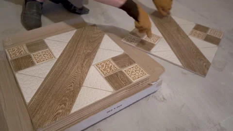 Hands to take a ceramic tile Stock Footage 159562442