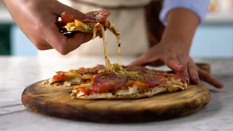 Hands take a cut piece of pizza out of the box. restaurant tasty fresh cuisine Vídeos de archivo 336586631
