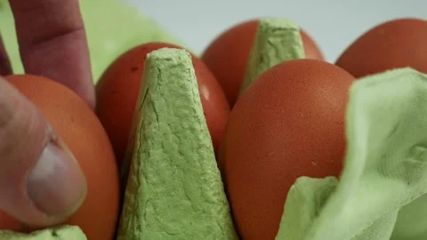 Hands take eggs from the box. Close up 스톡 동영상 102129815