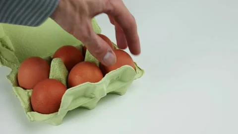 Hands take eggs from the box Stock Footage 102129779