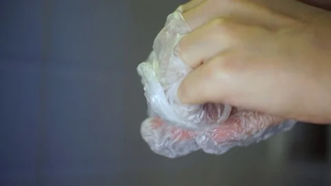 Hands take off medical gloves Stock Footage 123770727