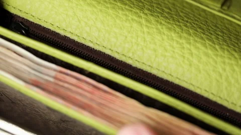 Hands take out ruble banknotes from a wallet, close-up. Cash, five thousand Stock Footage 163012070