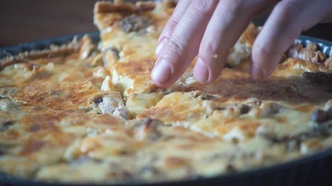 Hands take a piece of cake. Close-up. Pie and bakery. Bake food on cuisine. Stock Footage 124756134