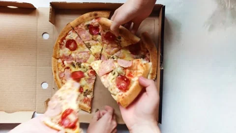 Hands take slices of pizza Stock Footage 158064667