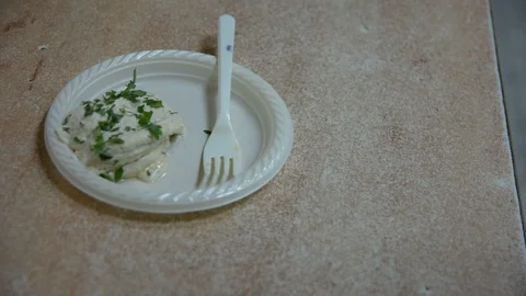 Hands takes hummus with bread from plastic plate 스톡 동영상 99766294