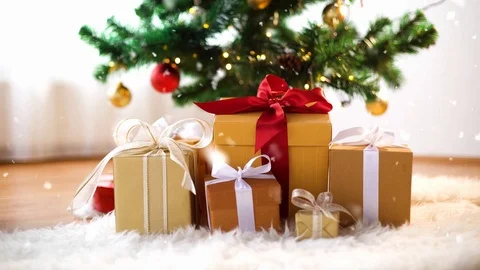 Hands taking gift box from under christmas tree Stock Footage 118083068