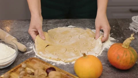 Hands taking out dough from raw cookies fall figures shape form pastry homemade Stock-Footage 218790379