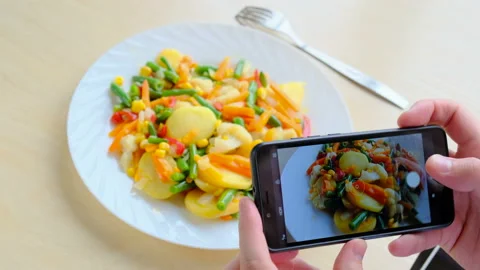 Hands Taking Picture Of Vegan Food Using Cell Phone Stock Footage