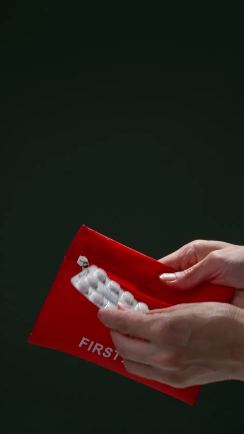 Hands Taking Pills from First Aid Kit Stock Footage 306925254