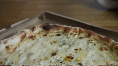 Hands taking pizza cheese slice from the box Stock Footage 136110501