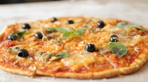 Hands taking pizza cuts from plate on table. Stock Footage 65627357