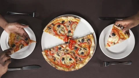 Hands taking pizza cuts from plate on table top view . pizza with mozzarella 스톡 동영상 336586680