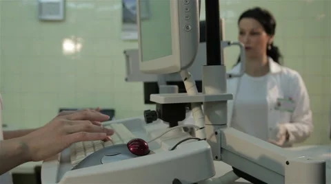 Hands tapping on the keyboard, blurred lab technician working on medical device. Stock Footage 52329784