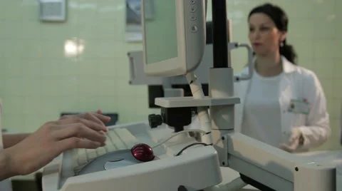 Hands tapping on keyboard, lab technician working on device for sample analysis Stock-Footage 52261589