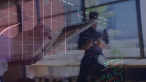 Hands tapping tablet causing code scrolling, grid emerging, charts expanding for Stock Footage 326626355