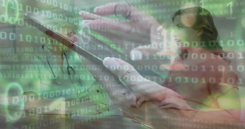 Hands tapping tablet code fading revealing doctor noting symptoms during medical Stock Footage 314172599