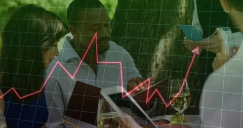 Hands tapping tablet while group checking phone at patio, animated finance chart Stock Footage 331713363