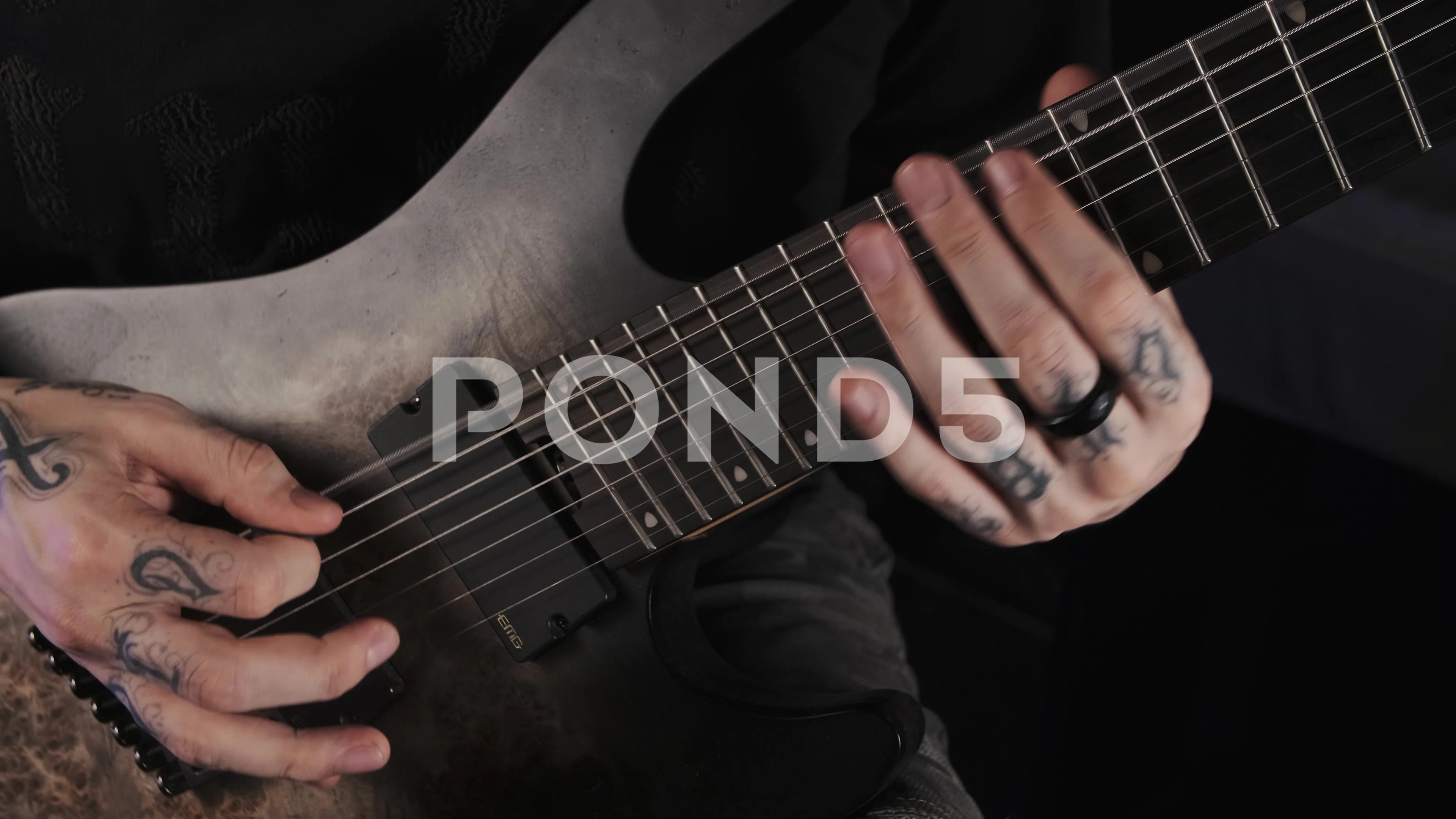 Hands with tattoo on guitar neck  Stock Video  Pond5