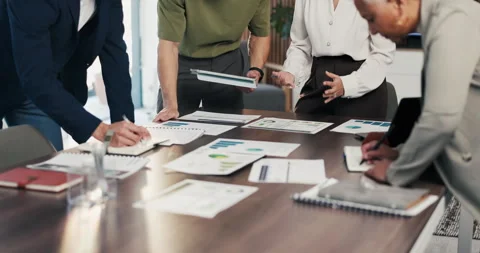 Hands, team and documents at office meeting for charts, review or point with Stock Footage 335270991