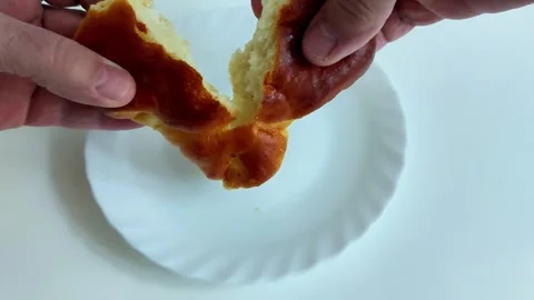 Hands Tear Fresh Bun Over White Plate Showing Soft Fluffy Interior Stock Footage 329404243