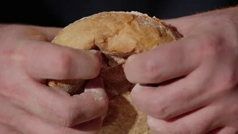 Hands Tearing Bread Roll Stock Footage 254598401