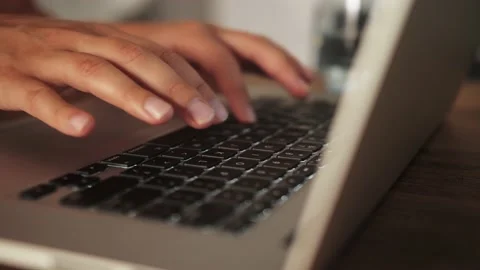 Hands texting on laptop keyboard close up. Businessperson emailing to client Video stock 210470325