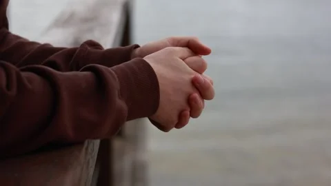 Hands thinking near water Stock Footage 281256148