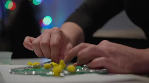 Hands Thread Tinsel on Glitter Star Christmas Craft Stock-Footage 347146832