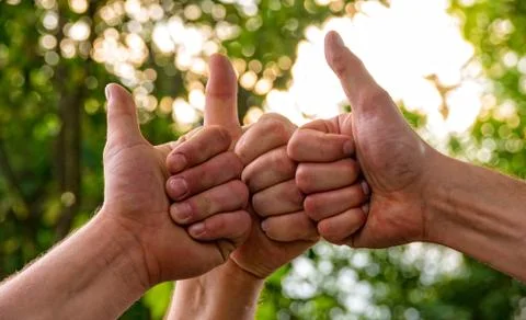 Hands with the thumb face-up Stock Photos