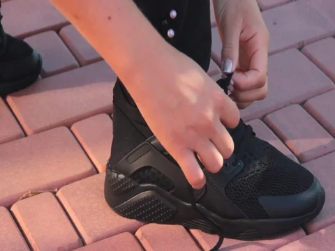 Hands tie sneakers Video stock 80185288
