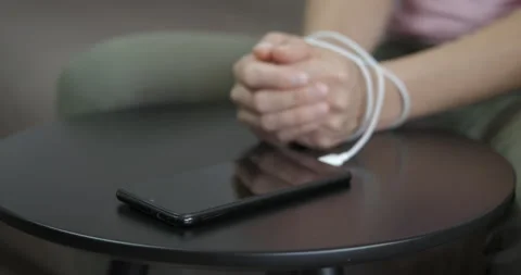 Hands tied to the phone. Stock Footage 161454222