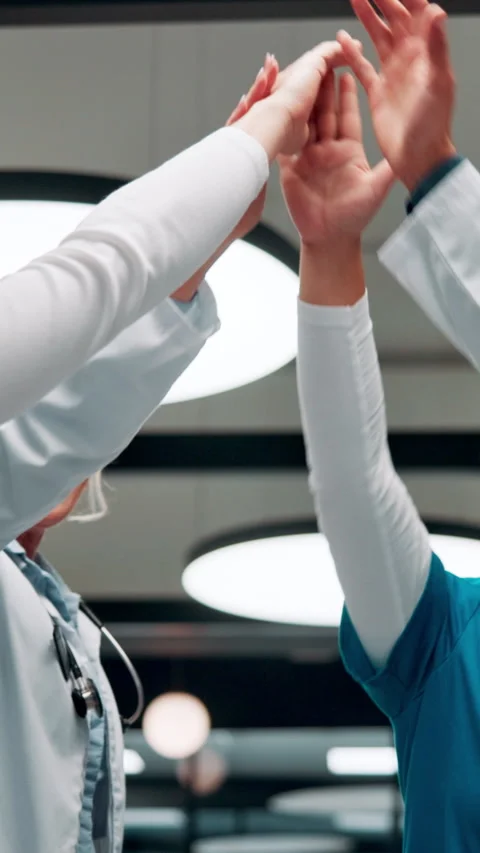 Hands, together and doctors clapping for success, celebration or hospital Stock Footage 335918748