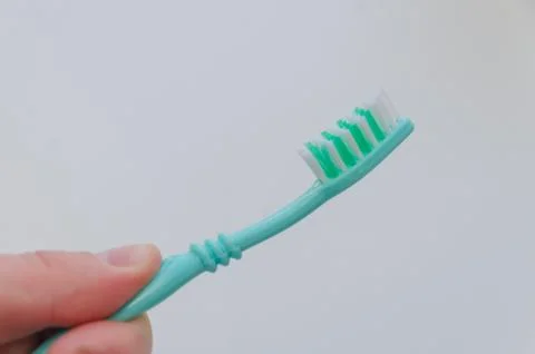 In the hands of the toothbrush, close-up 库存照片