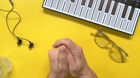 Hands top view. Man using her smartphone with green screen in table , scrolling Stock Footage 130064307