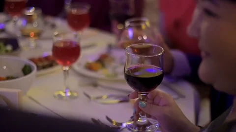 Hands touch glasses slowmotion Stock Footage 98223671