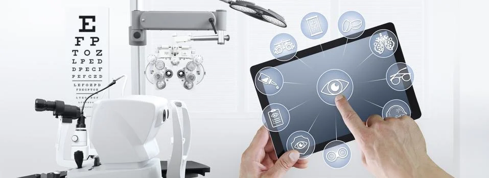 Hands touch screen of digital tablet with ophthalmologist and optometrist ico Stock Photos
