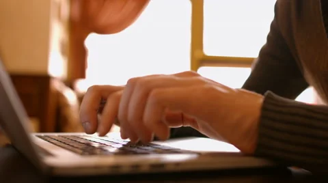 Hands touch typing on a laptop keyboard in the cafe Stock Footage 50203645
