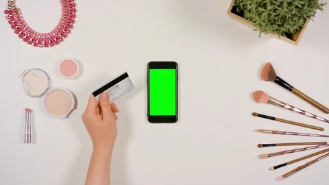 Hands Touching Smartphone and Holding Credit Card Stock Footage 85478596