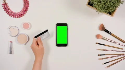 Hands Touching Smartphone and Holding Credit Card Stock Footage 85479686